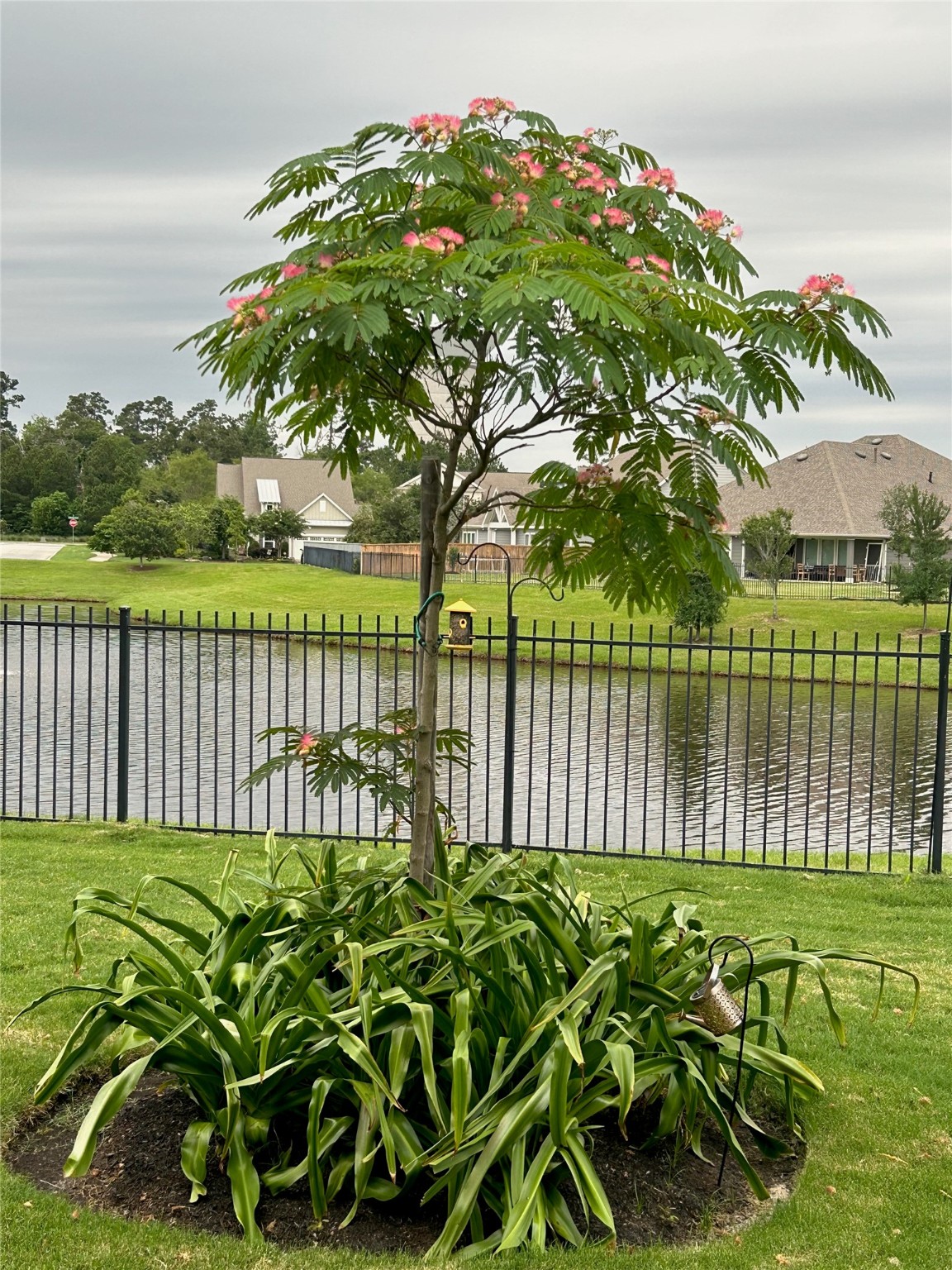 2149 Rope Maker Road Conroe, TX 77384 - Photo 32 of 45 a garden view with a playing court