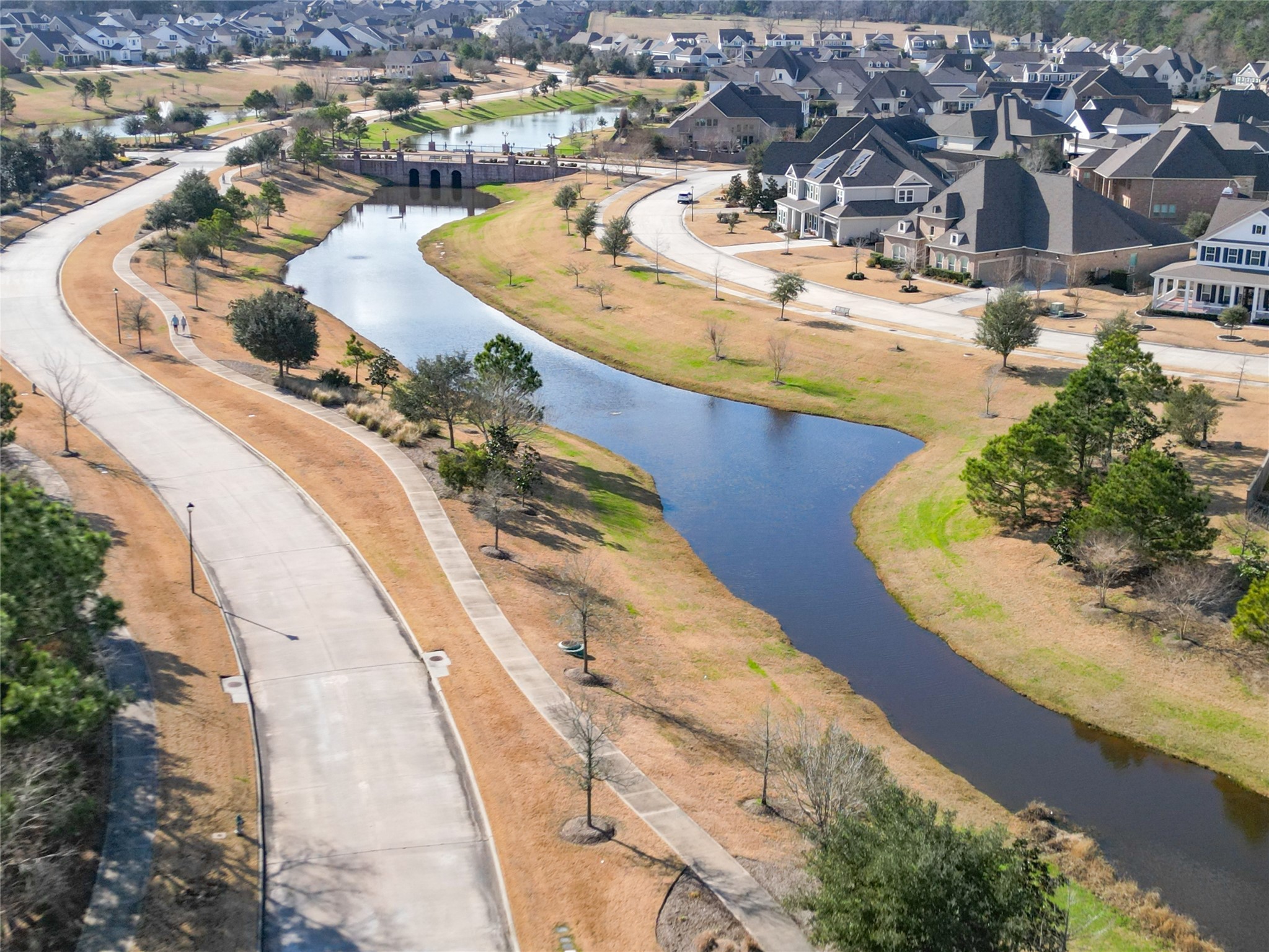 2149 Rope Maker Road Conroe, TX 77384 - Photo 35 of 45 a view of a swimming pool with outdoor seating