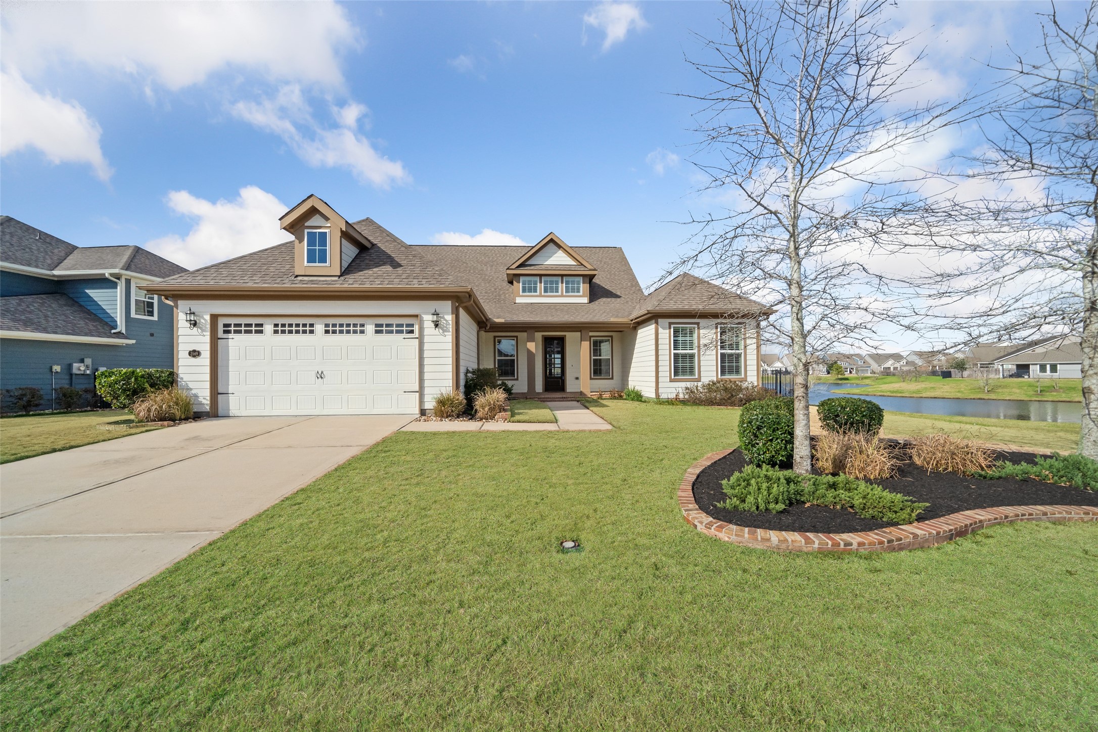 2149 Rope Maker Road Conroe, TX 77384 - Photo 44 of 45 a front view of a house with a yard