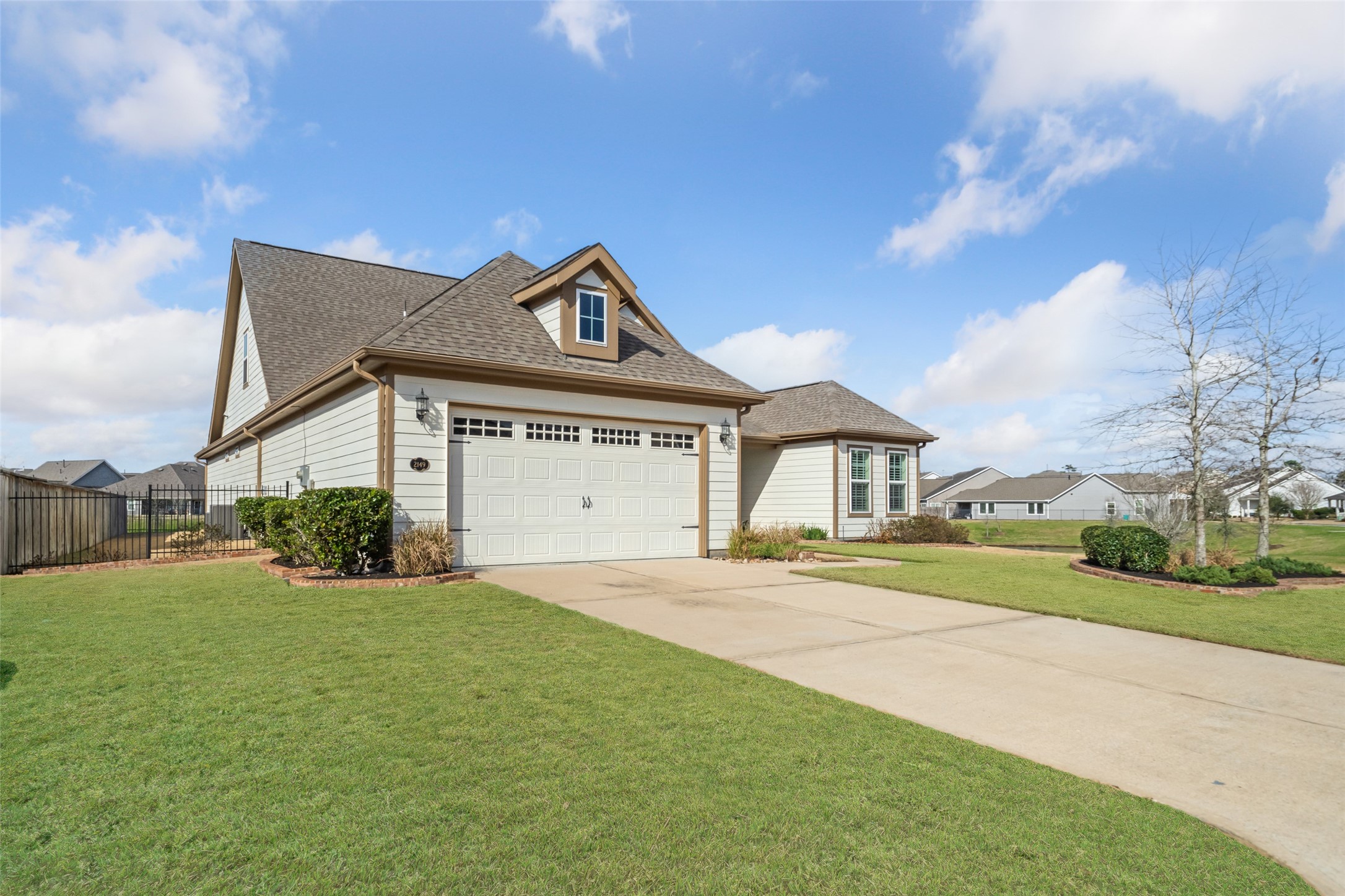 2149 Rope Maker Road Conroe, TX 77384 - Photo 45 of 45 a front view of a house with a yard