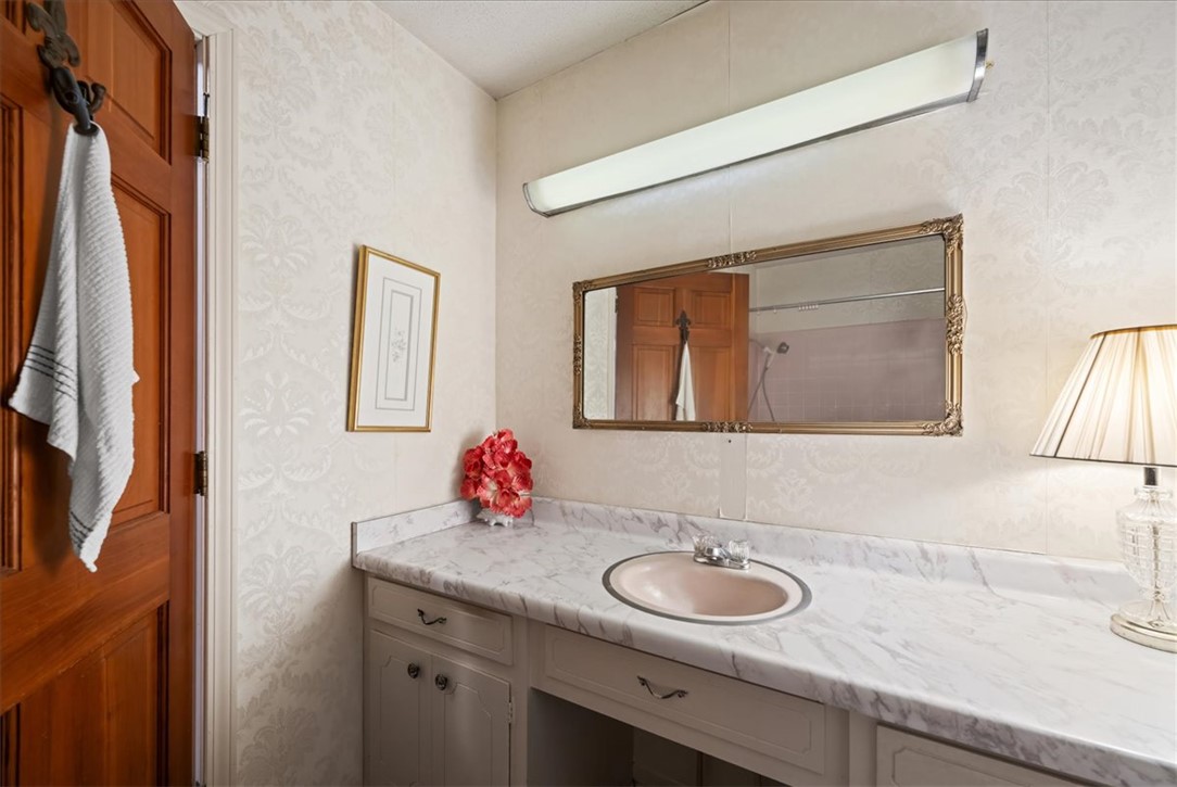 304 Shaw Road Honea Path, SC 29654 - Photo 19 of 39 Functional bathroom with ample counter space and traditional vanity.