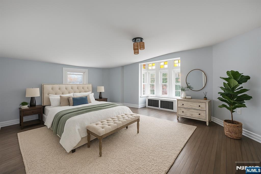 684 Closter Dock Road Closter, NJ 07624 - Photo 18 of 30 a bedroom with bed and windows