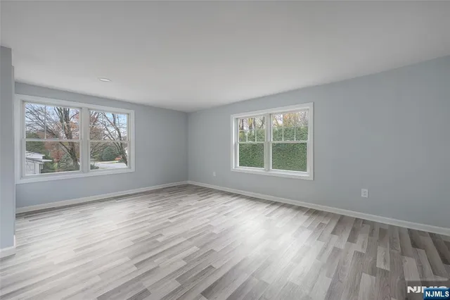 a view of a house with a yard porch and sitting area