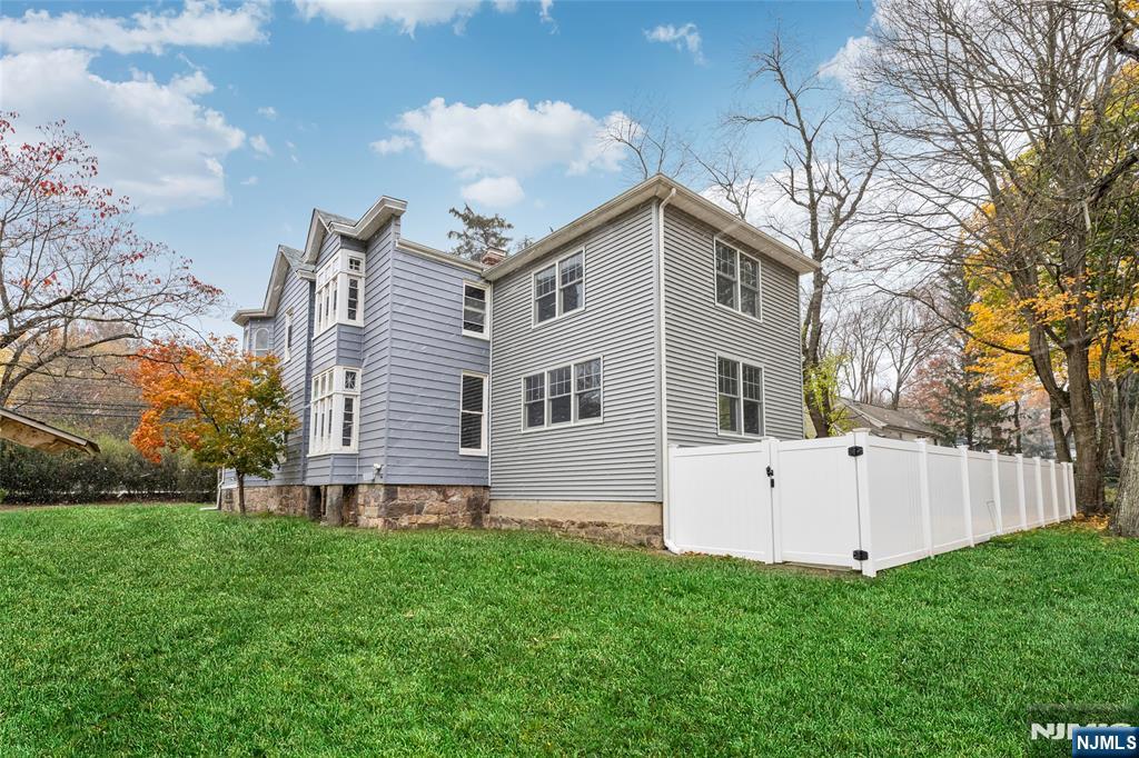 684 Closter Dock Road Closter, NJ 07624 - Photo 29 of 30 a front view of house with a garden