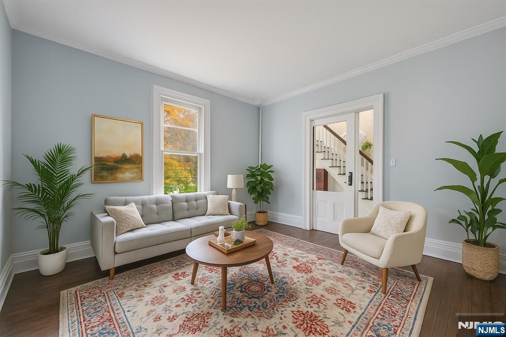 684 Closter Dock Road Closter, NJ 07624 - Photo 4 of 30 a living room with furniture potted plant and a window