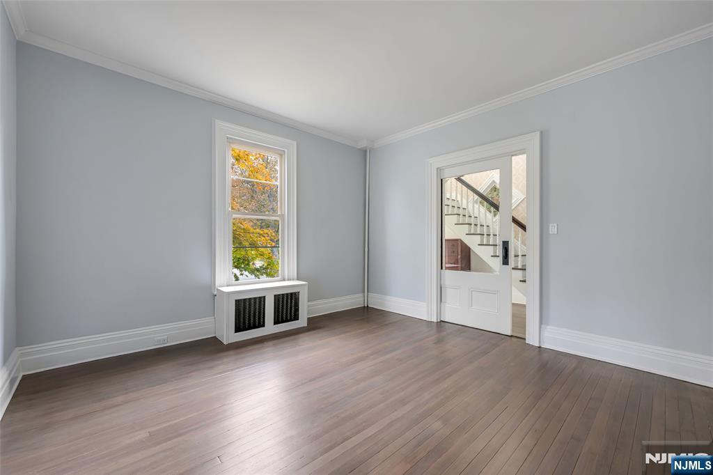684 Closter Dock Road Closter, NJ 07624 - Photo 5 of 30 wooden floor in an empty room with a window