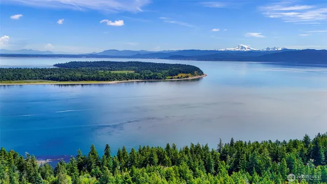 a view of a lake in front of a building