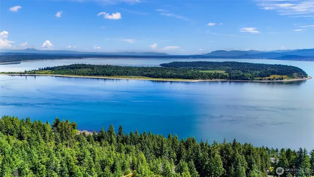 a view of a lake in a sunset