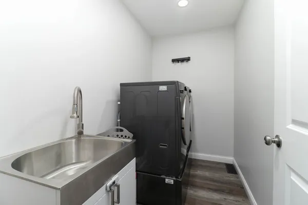 a bathroom with a sink and mirror
