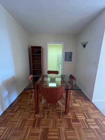 a workspace with furniture and window