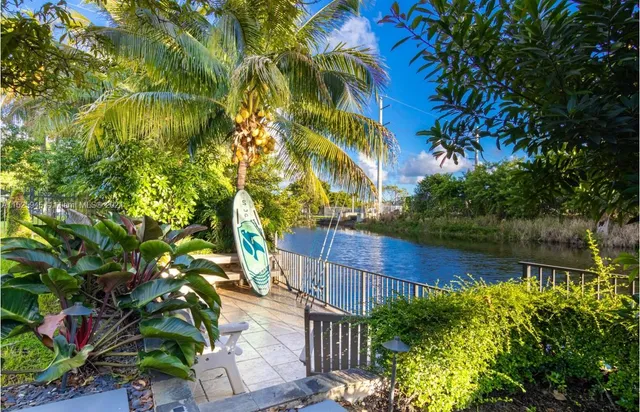 a view of a chairs and table in the terrace