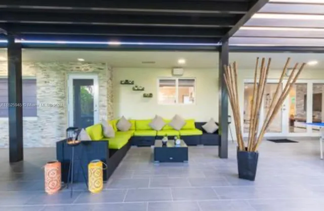 a outdoor dining space with furniture