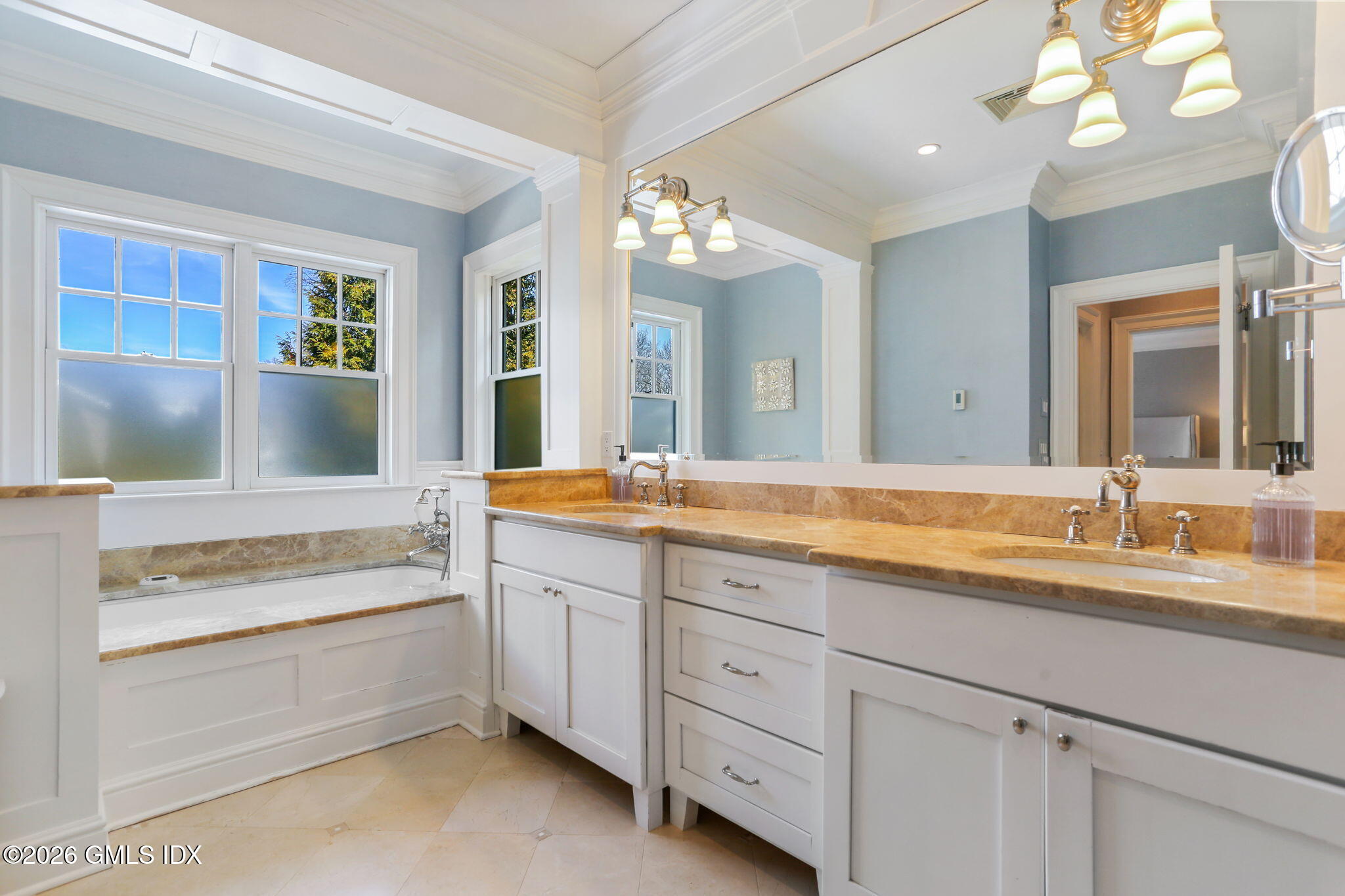 1 Bramble Lane Riverside, CT 06878 - Photo 22 of 42 a bathroom with a tub sink and mirror