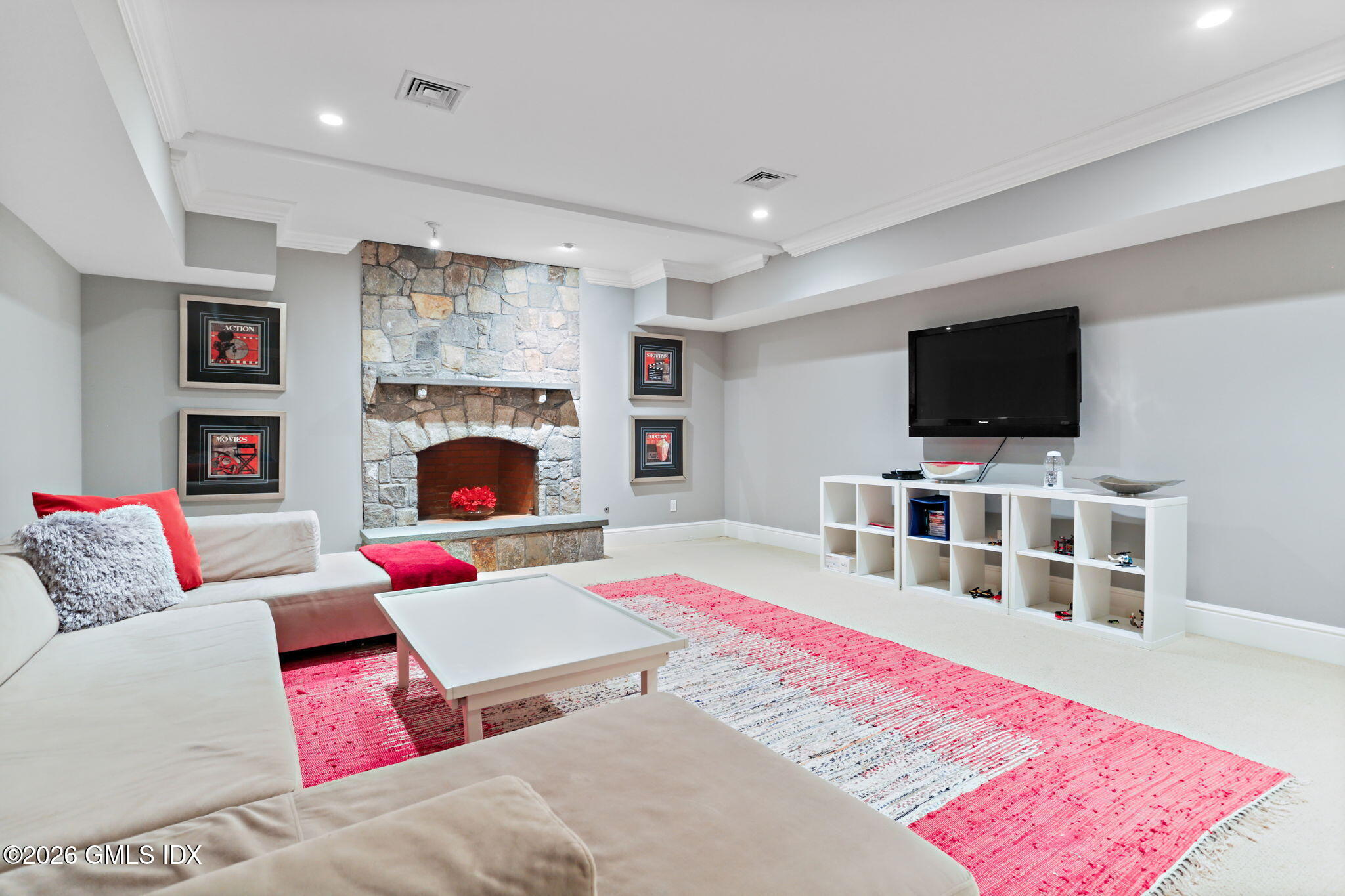 1 Bramble Lane Riverside, CT 06878 - Photo 34 of 42 a living room with furniture and a flat screen tv
