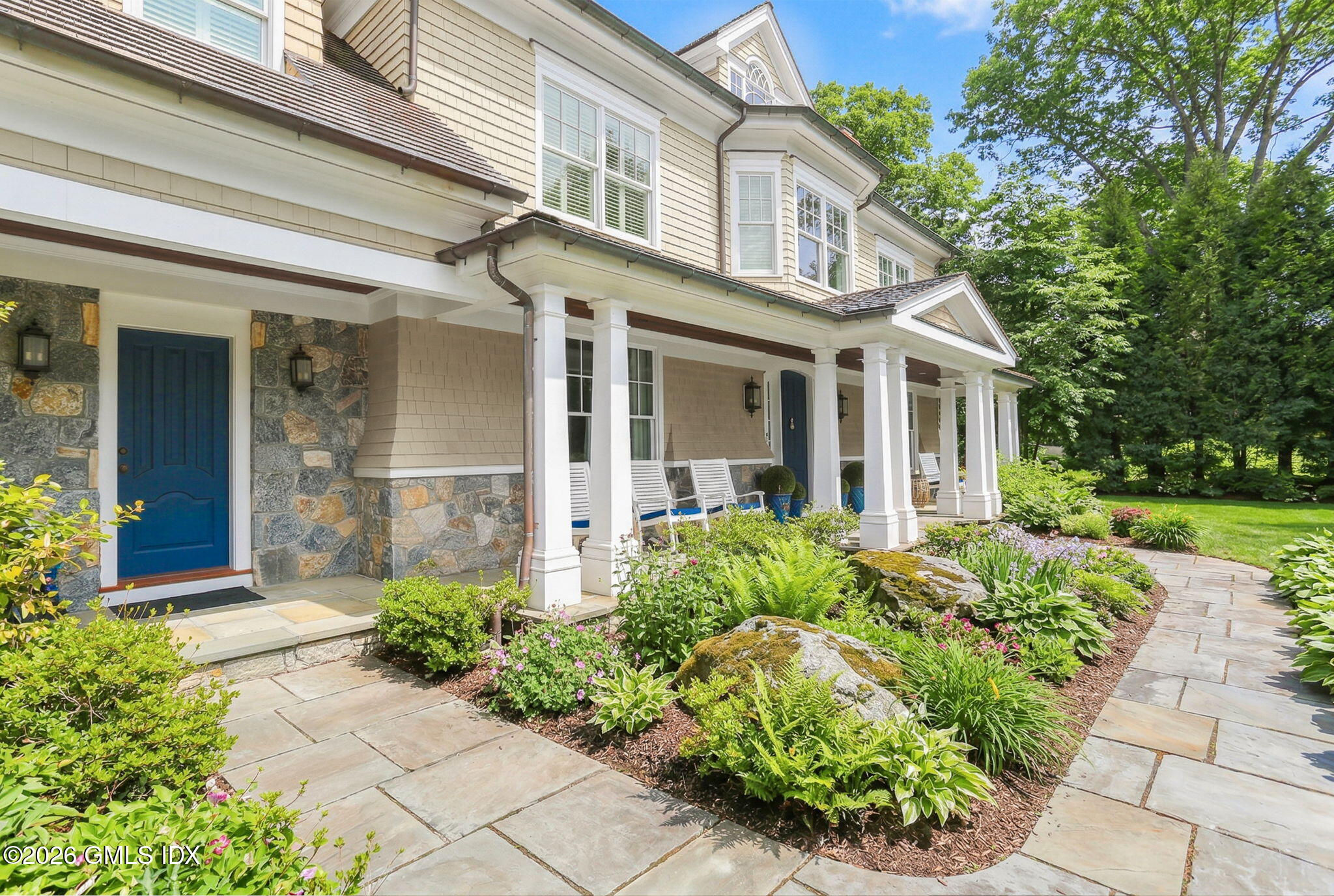 1 Bramble Lane Riverside, CT 06878 - Photo 36 of 42 a front view of a house with garden