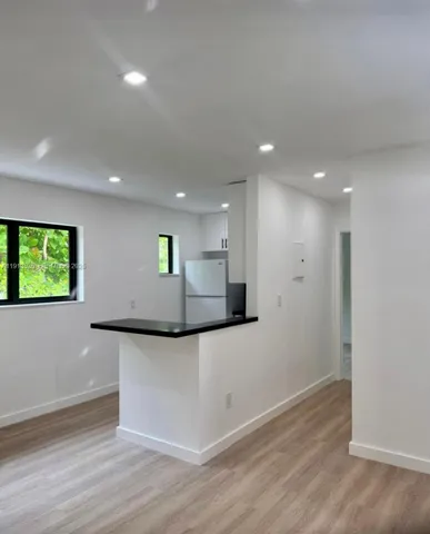 a view of a room with a window