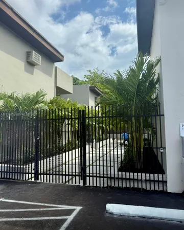 a view of backyard with green space