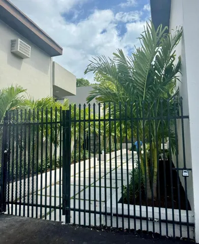 a view of pathway along with yard