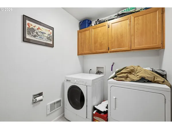 a view of backyard with seating space