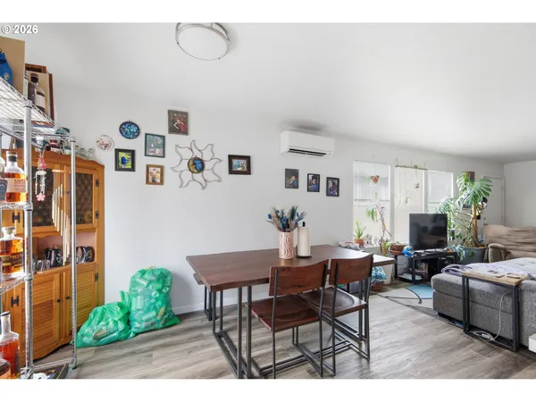 a view of a living room and kitchen