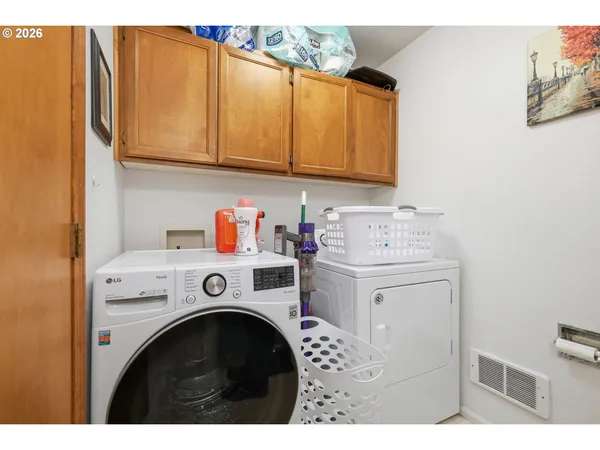a view of a backyard with potted plants