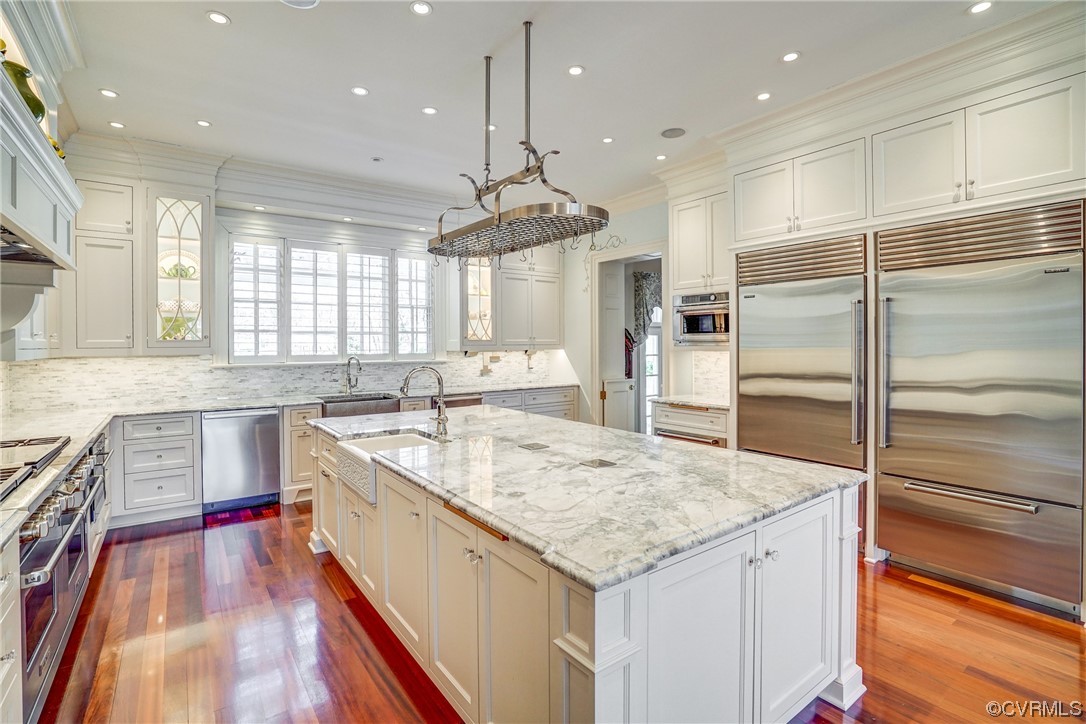 501 Rivergate Drive Henrico, VA 23238 - Photo 11 of 50 a kitchen with stainless steel appliances granite countertop a sink stove and refrigerator