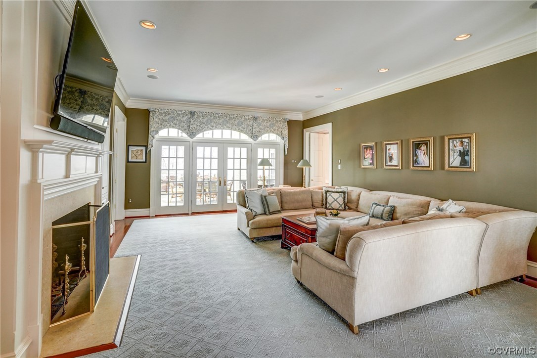501 Rivergate Drive Henrico, VA 23238 - Photo 17 of 50 a living room with furniture fireplace and flat screen tv