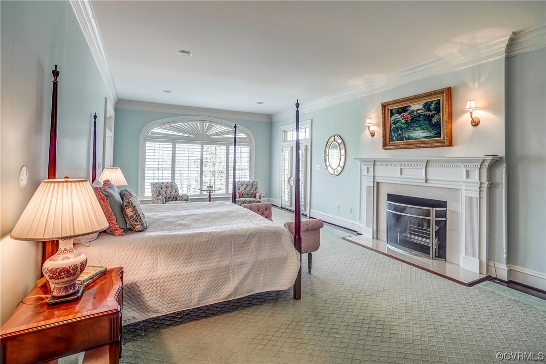 501 Rivergate Drive Henrico, VA 23238 - Photo 18 of 50 a bedroom with a bed and a fireplace