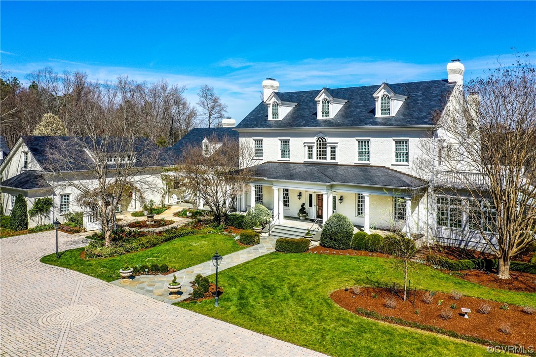 501 Rivergate Drive Henrico, VA 23238 - Photo 2 of 50 a front view of a house with a yard table and chairs