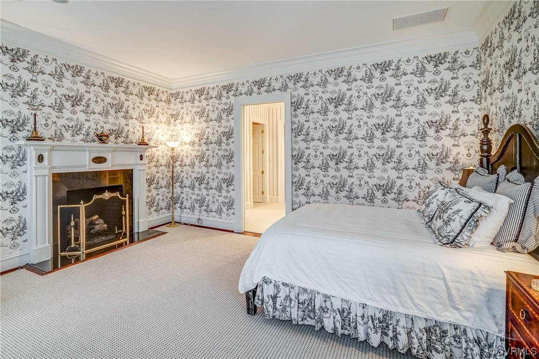 501 Rivergate Drive Henrico, VA 23238 - Photo 23 of 50 a bedroom with a bed and a fireplace