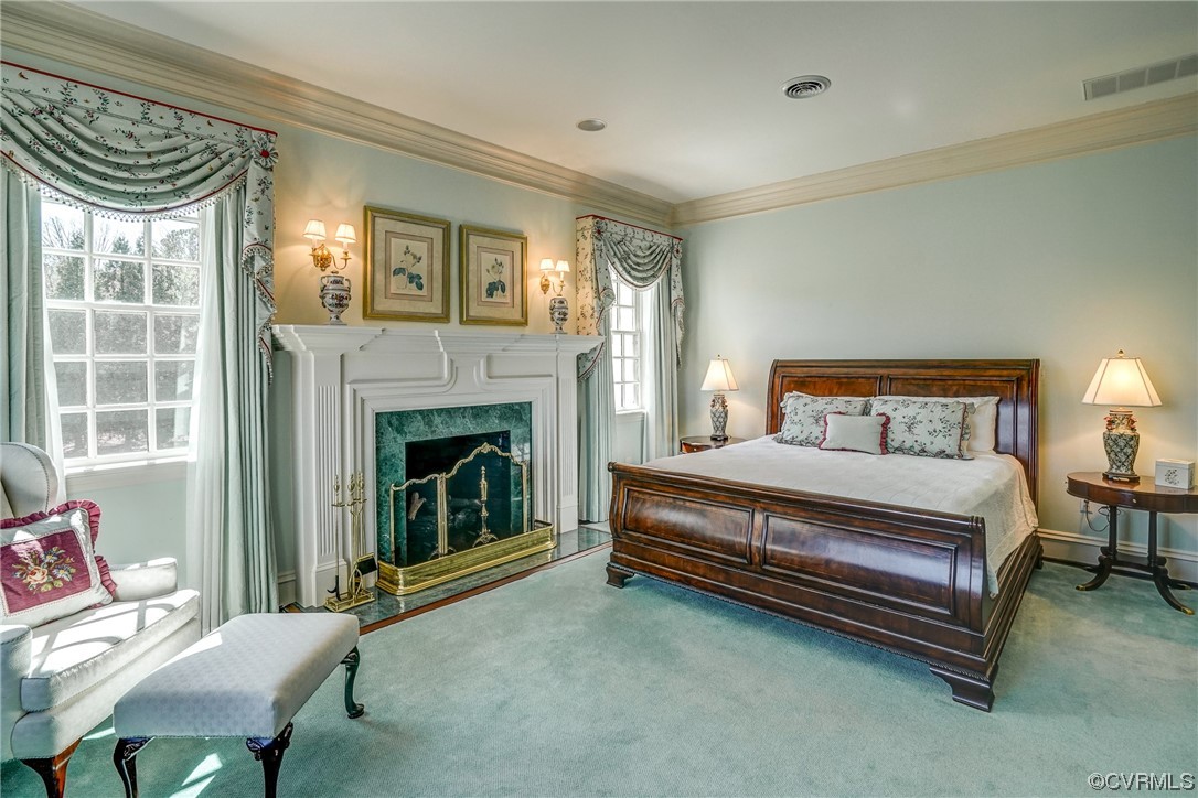 501 Rivergate Drive Henrico, VA 23238 - Photo 25 of 50 a bedroom with a bed chair and a fireplace