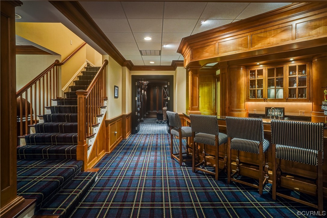 501 Rivergate Drive Henrico, VA 23238 - Photo 30 of 50 a view of a hall with wooden floor and furniture