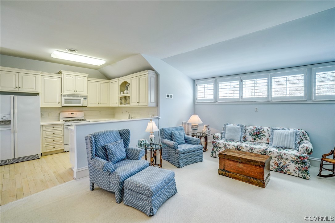 501 Rivergate Drive Henrico, VA 23238 - Photo 36 of 50 a living room with furniture and kitchen view