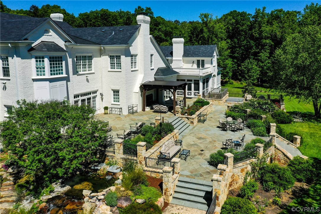 501 Rivergate Drive Henrico, VA 23238 - Photo 38 of 50 a front view of a house with a garden