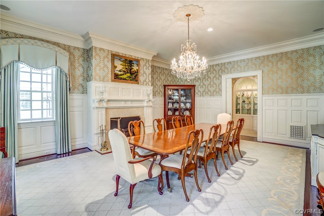 501 Rivergate Drive Henrico, VA 23238 - Photo 8 of 50 a view of a dining room with furniture and chandelier