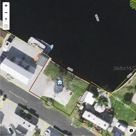 a view of swimming pool with outdoor seating