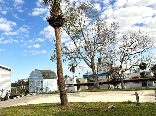 a view of a swimming pool with a lake view
