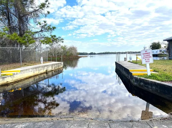 a view of a lake with a city view