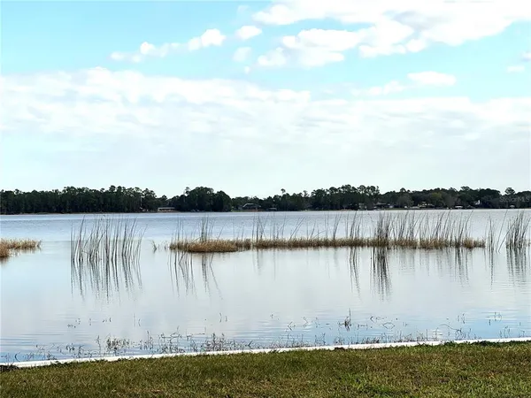 a view of houses with a street