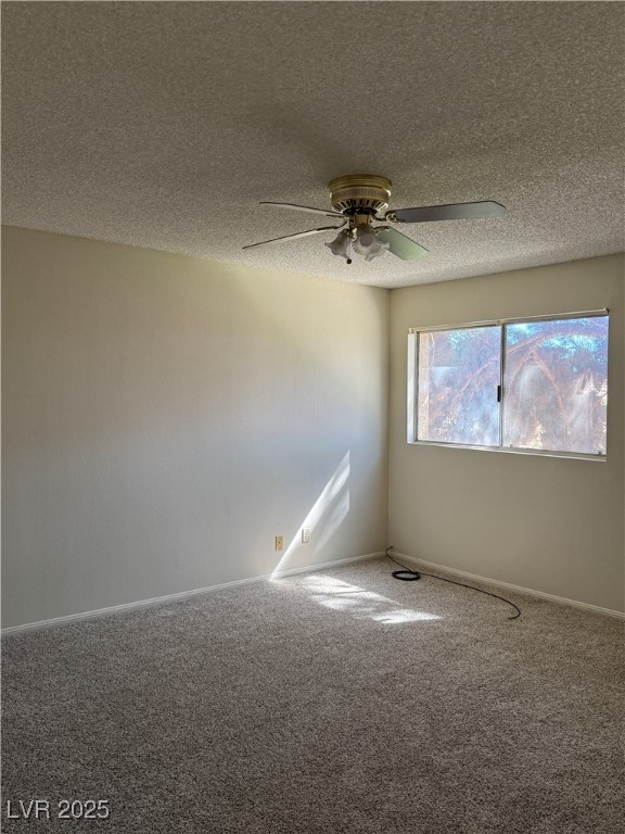 3367 Reka Street Las Vegas, NV 89121 - Photo 18 of 38 Carpeted empty room with a textured ceiling and a ceiling fan