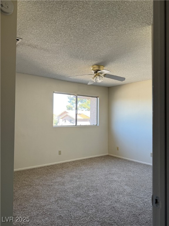 3367 Reka Street Las Vegas, NV 89121 - Photo 24 of 38 Empty room featuring carpet, a textured ceiling, and ceiling fan