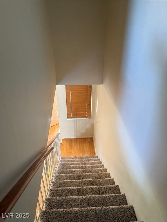 3367 Reka Street Las Vegas, NV 89121 - Photo 25 of 38 Staircase with wood finished floors
