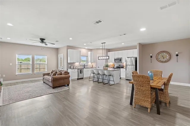 a living room with furniture and a table