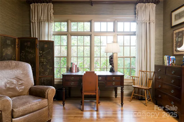 a living room with furniture and a window