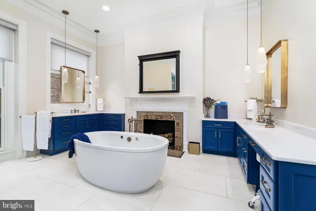 a kitchen with a refrigerator and a stove top oven
