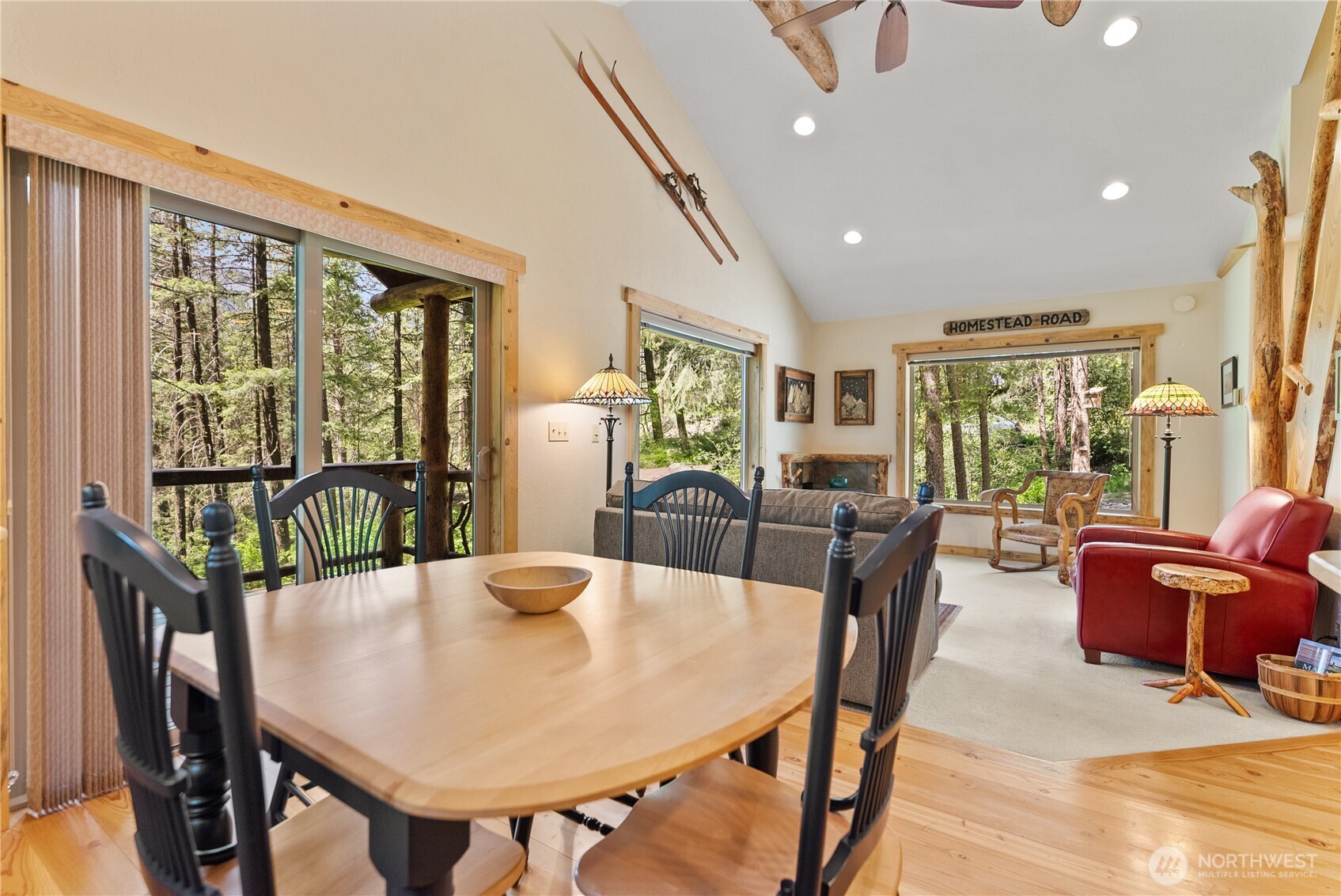98 Homestead Road Winthrop, WA 98862 - Photo 13 of 40 a view of a dining room with furniture window and wooden floor