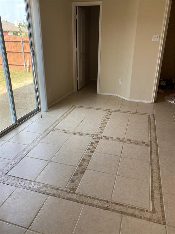 1416 Laurel Hall Lane Little Elm, TX 75068 - Photo 8 of 24 CERAMIC TILE IN KITCHEN