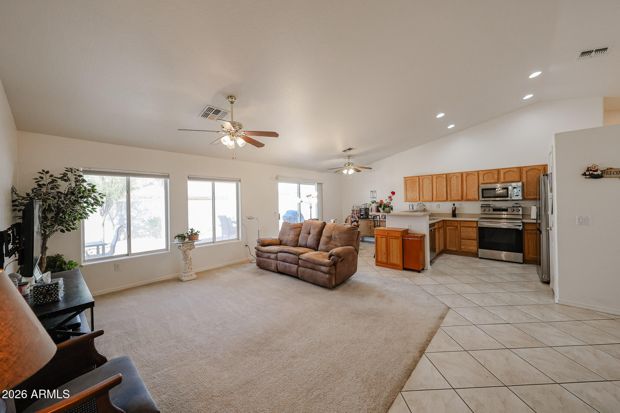 14980 South Capistrano Road Arizona City, AZ 85123 - Photo 6 of 39 a living room with furniture kitchen view and a large window