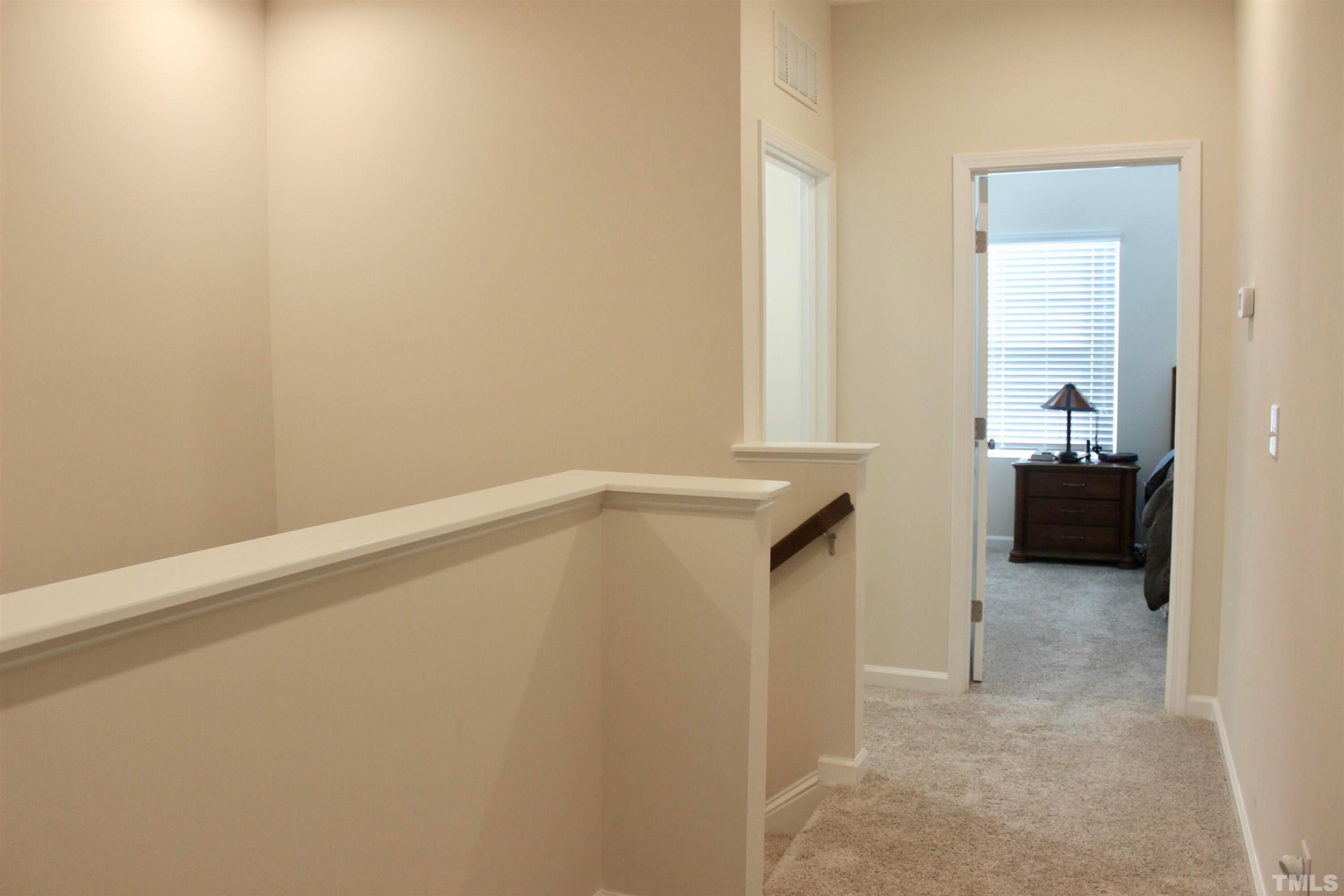 1608 Topaz Lane Apex, NC 27502 - Photo 10 of 23 a view of an empty room