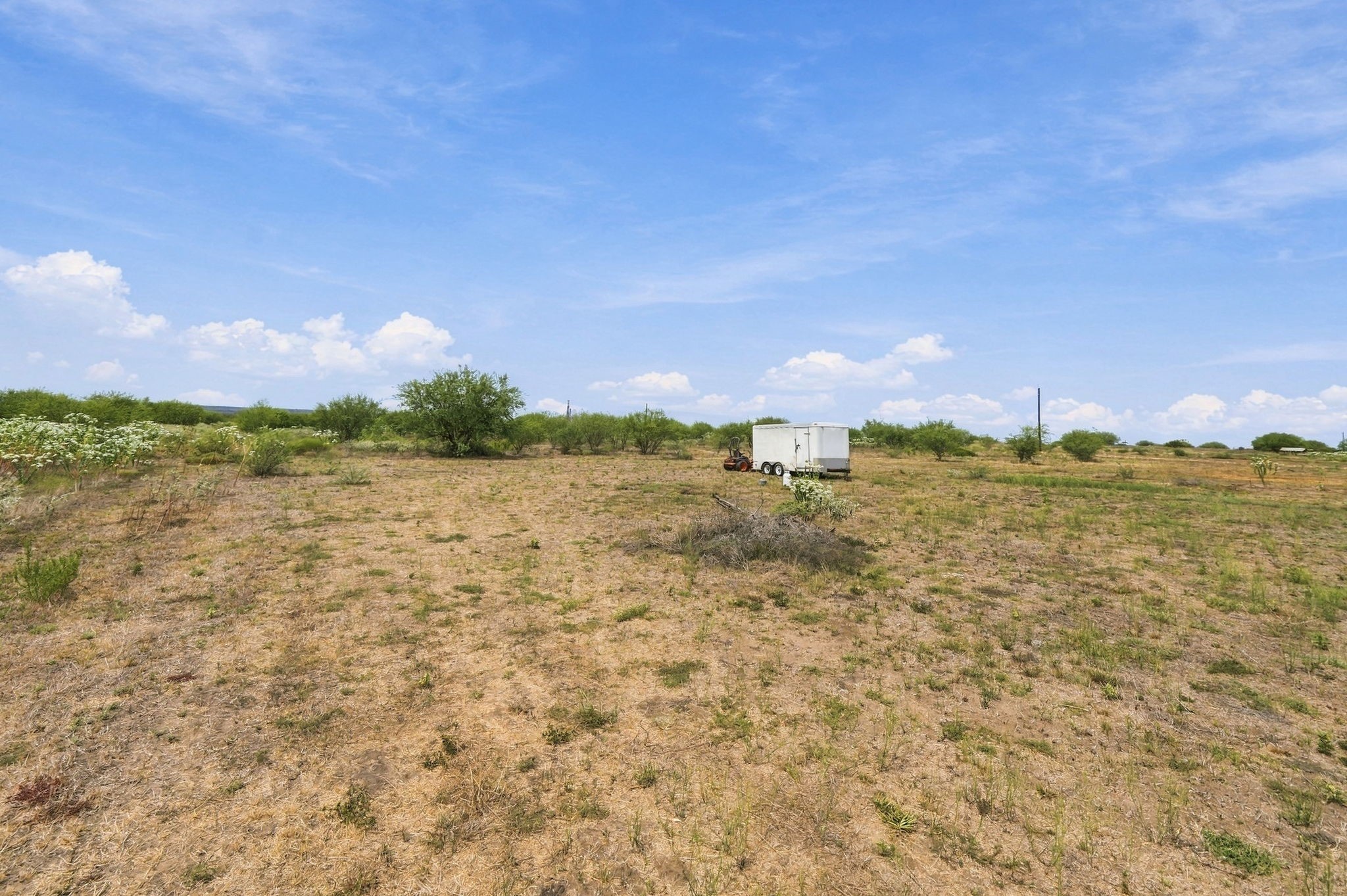 3898 Concrete-Edgar Road Cuero, TX 77954 - Photo 9 of 9 Eye-level perspective showcasing usable, open land with natural country vegetation and gentle topography.